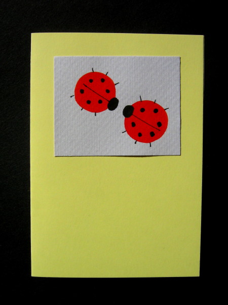 2 Ladybirds on Pale Yellow